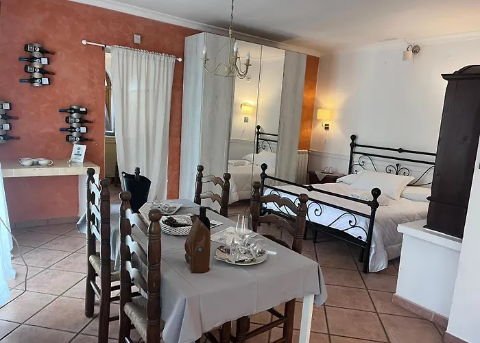 Апартаменты Osteria Del Cavaliere B&B E Maneggio Сакрофано