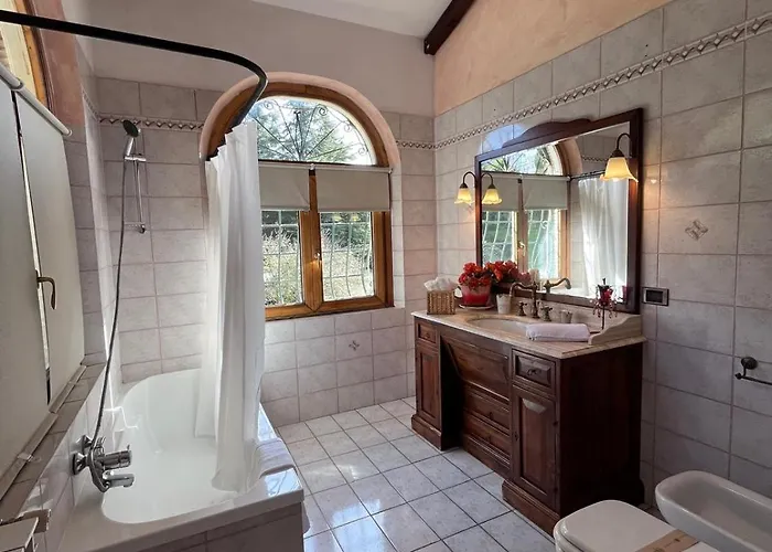 Апартаменты Osteria Del Cavaliere B&B E Maneggio